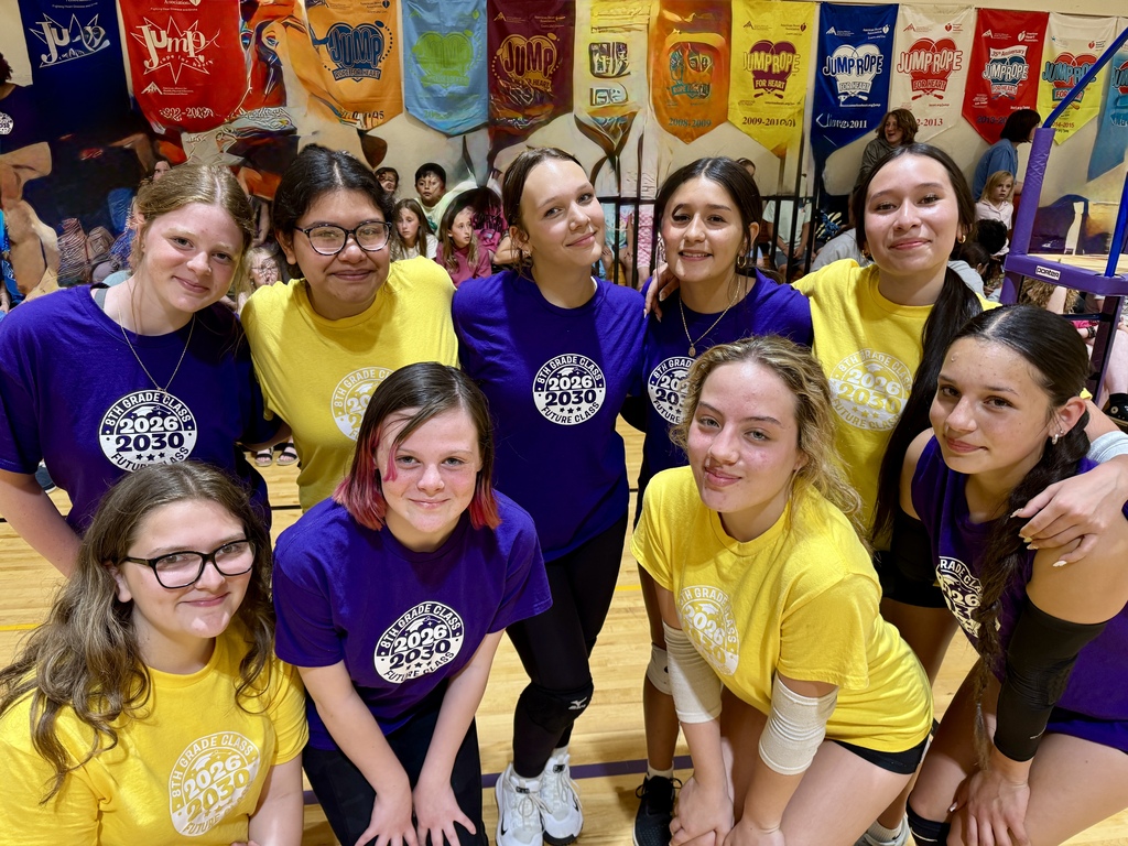 students and staff in the gym