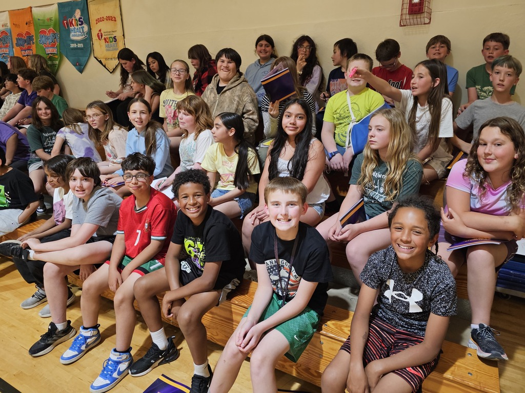 students and staff in the gym