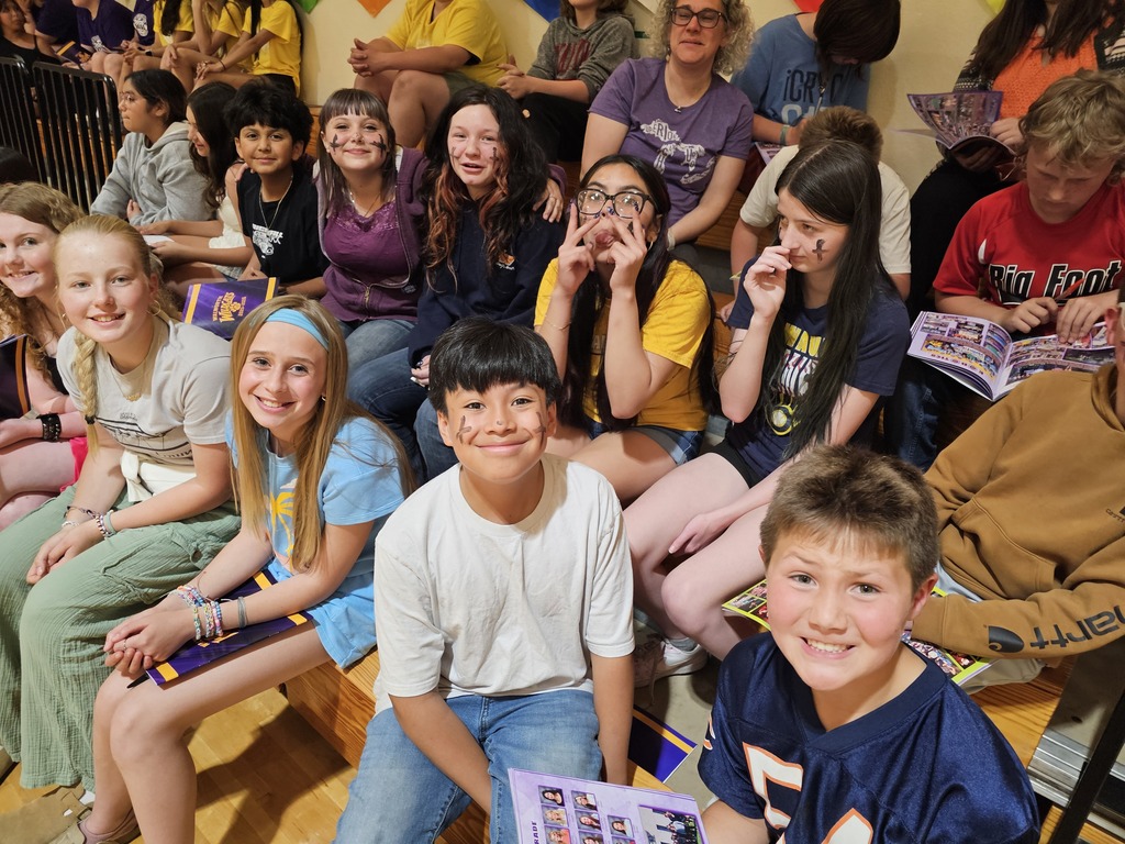students and staff in the gym