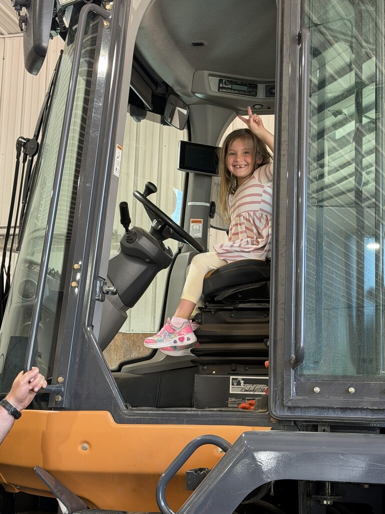 one student in a bulldozer