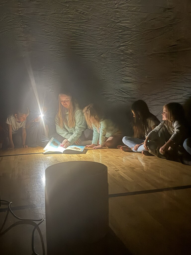 students reading in StarLab