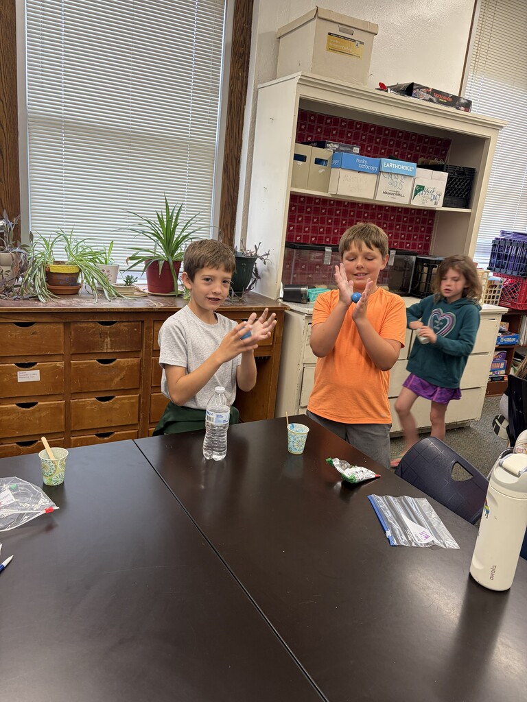Two students making slime