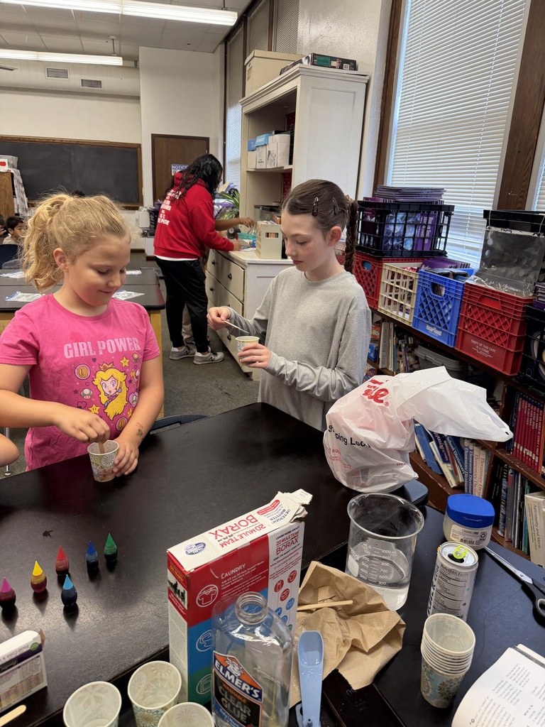 Two student making slime.