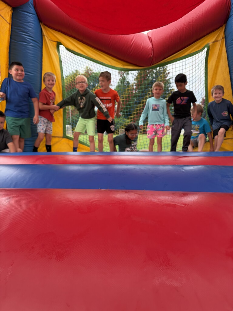 students in the bounce house