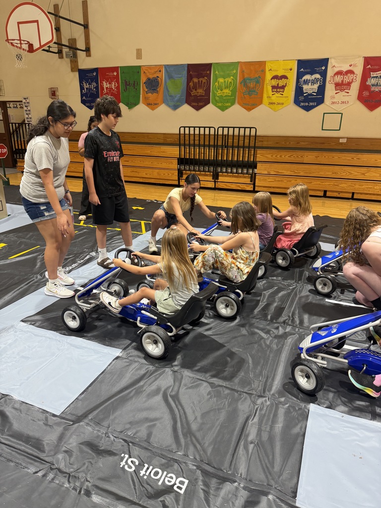 Students on pedal cars at Safety Town