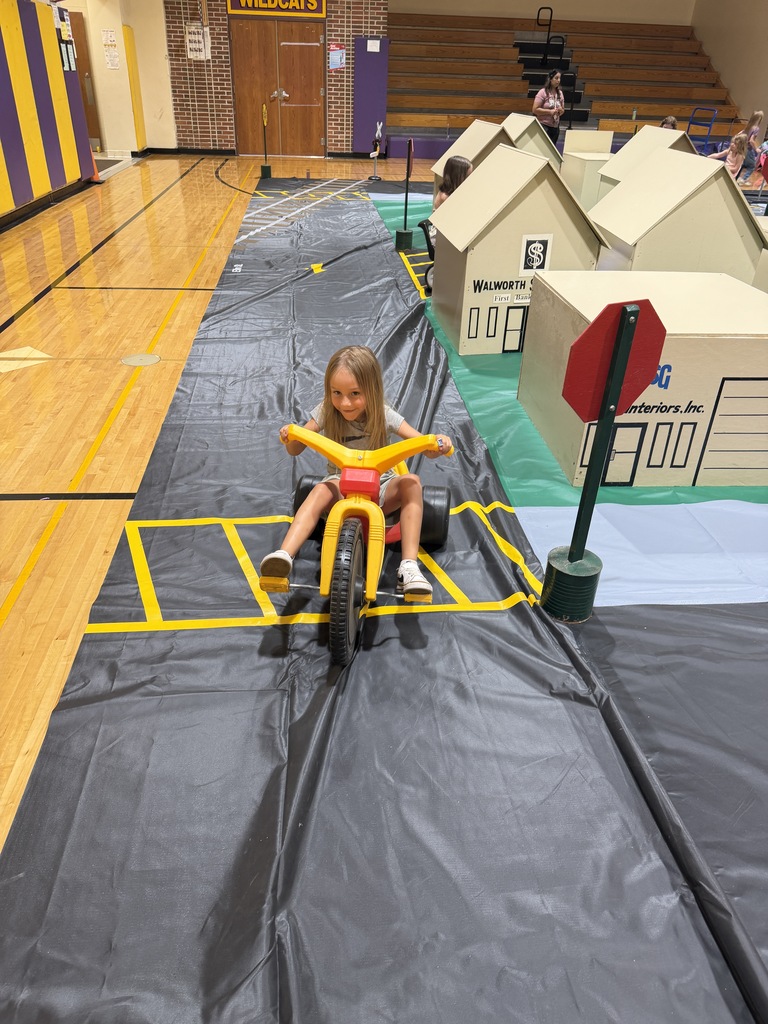 Student on pedal car at Safety Town