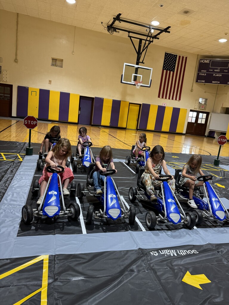 Students on pedal cars at Safety Town