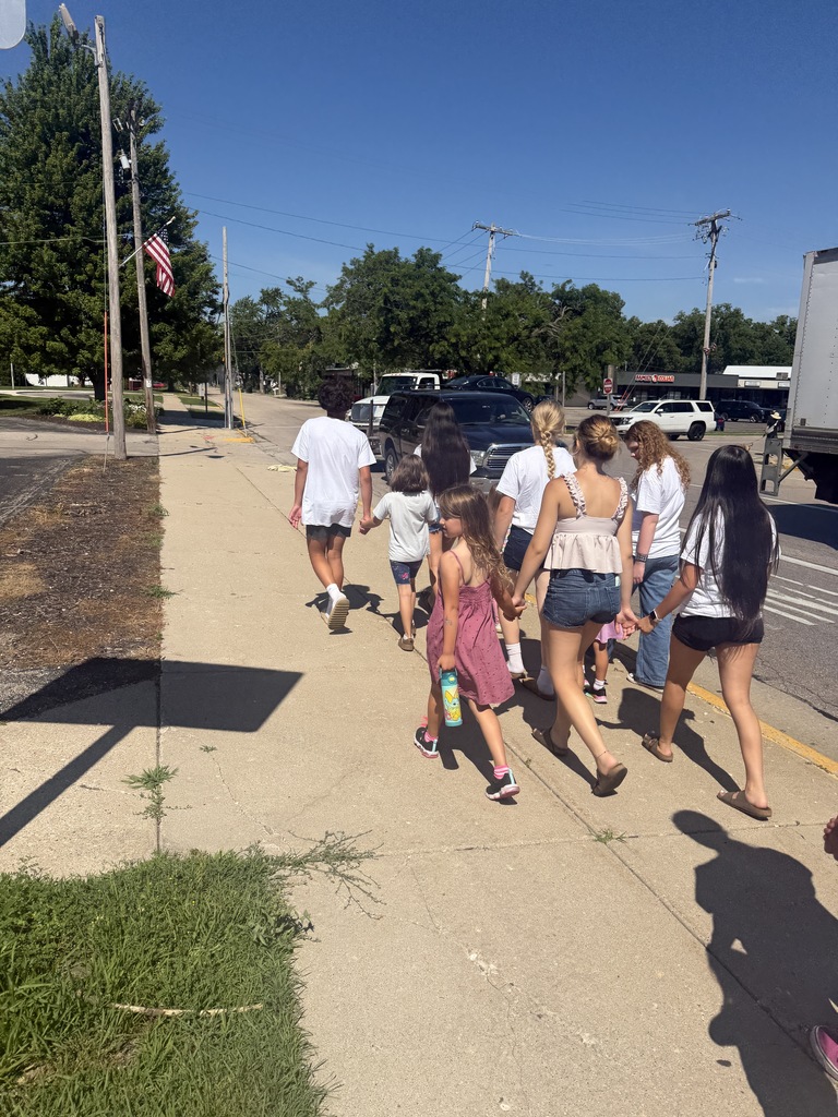 Walking on the street learning safety rules. 
