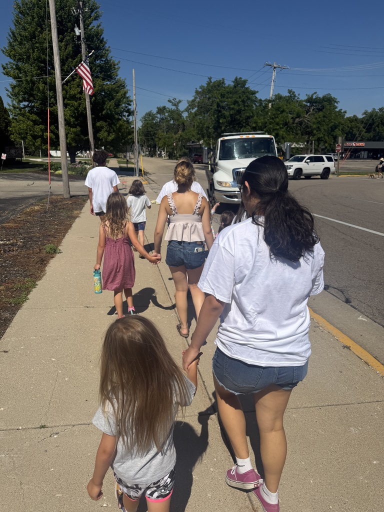 Walking on the sidewalk learning safety rules.