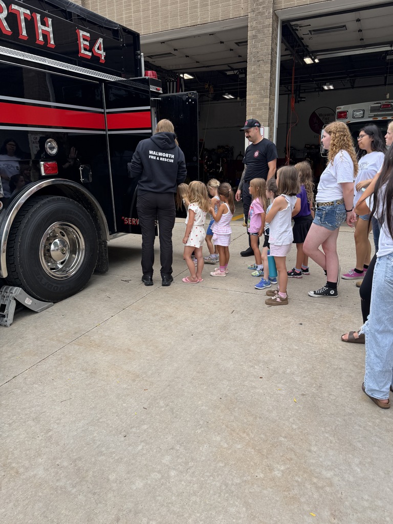 Students learning about the fire truck. 