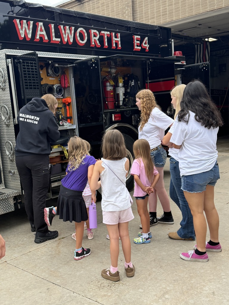 Students learning about the fire truck. 