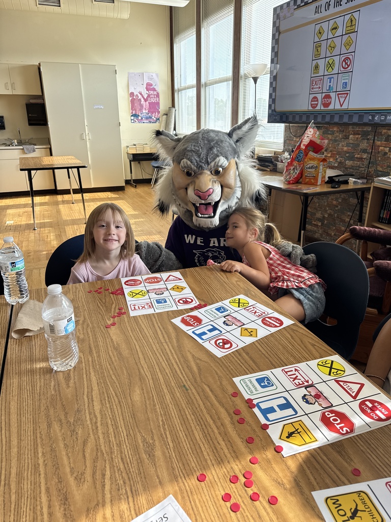 Wesley the Wildcat with students at Safety Town. 