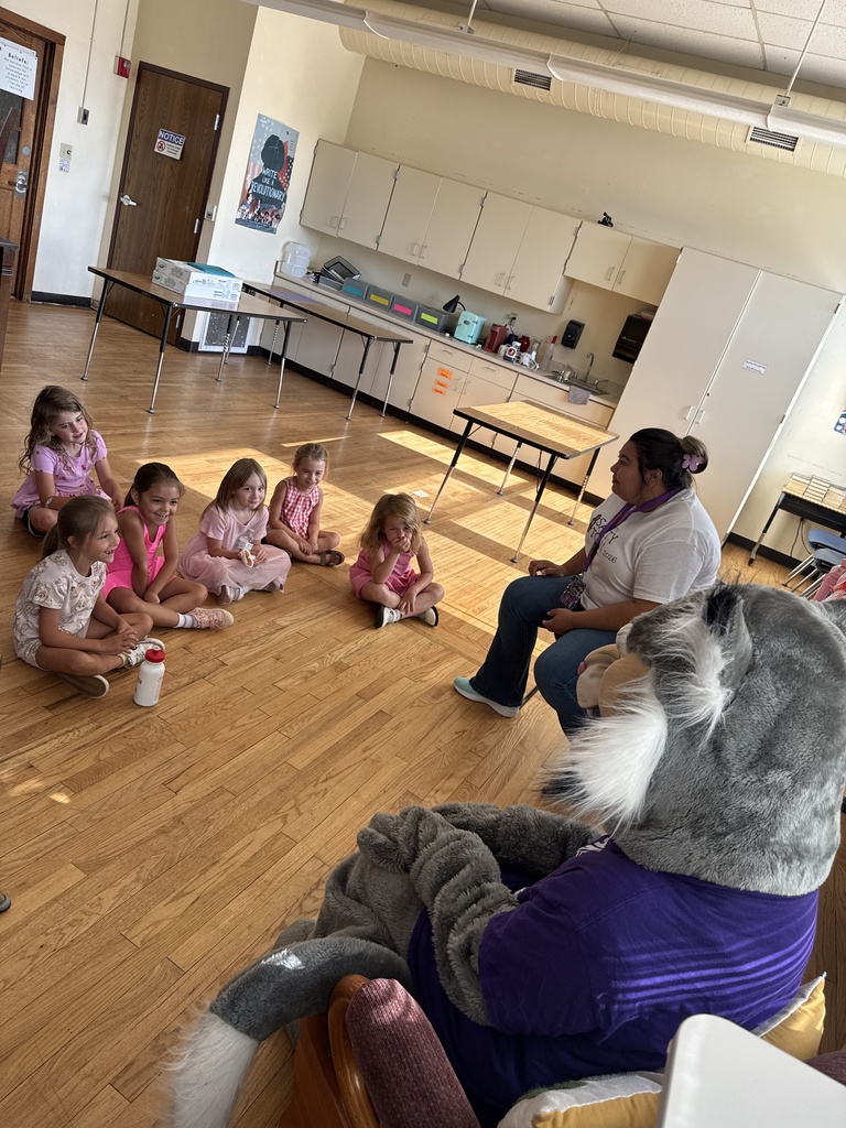 Wesley the Wildcat with students at Safety Town. 