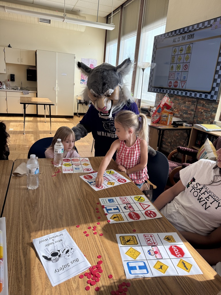 Wesley the Wildcat with students at Safety Town. 