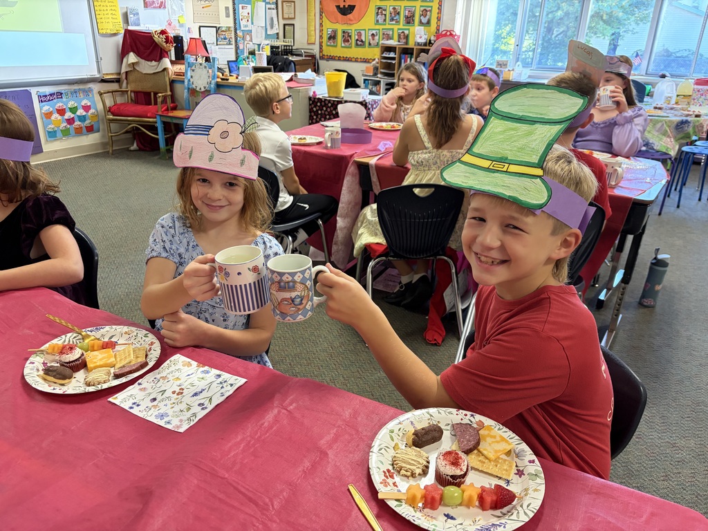 students drinking tea and having snacks