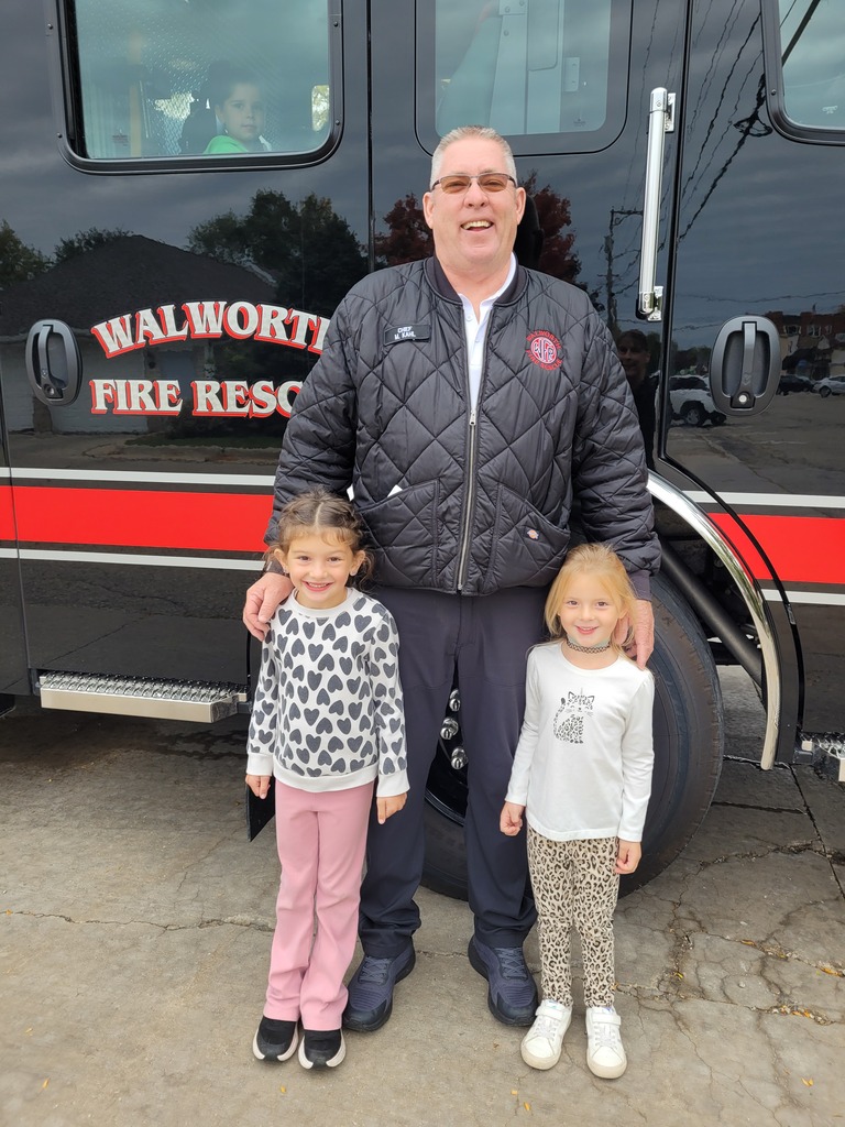 students with fireman