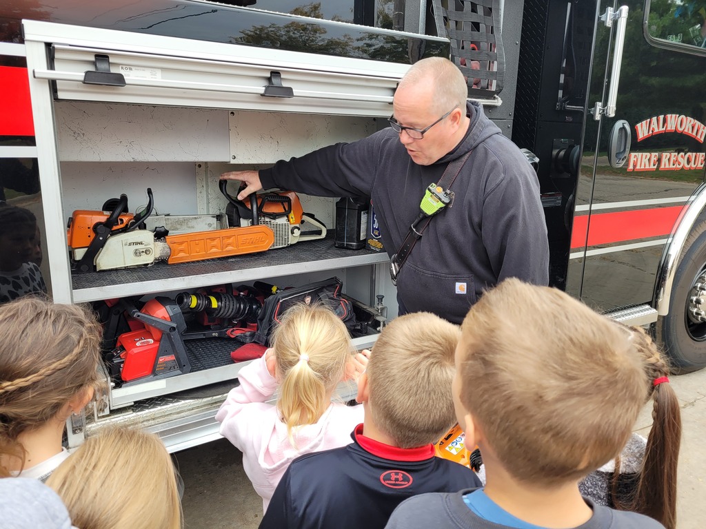 Students learning about the fire truck.