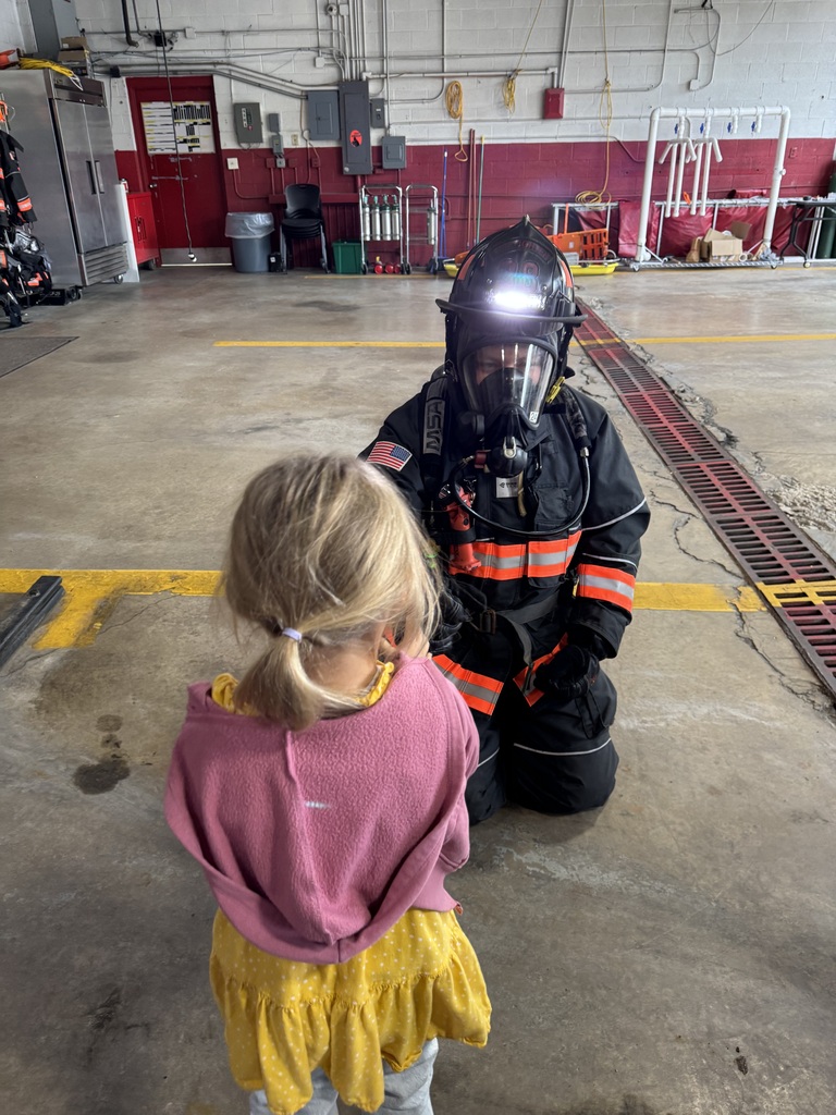 Students and a fireman. 