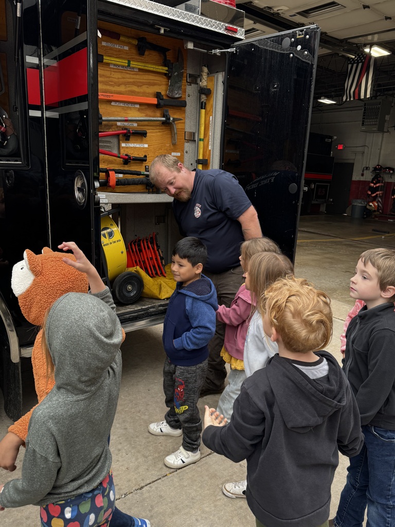 Students learning about the fire truck. 