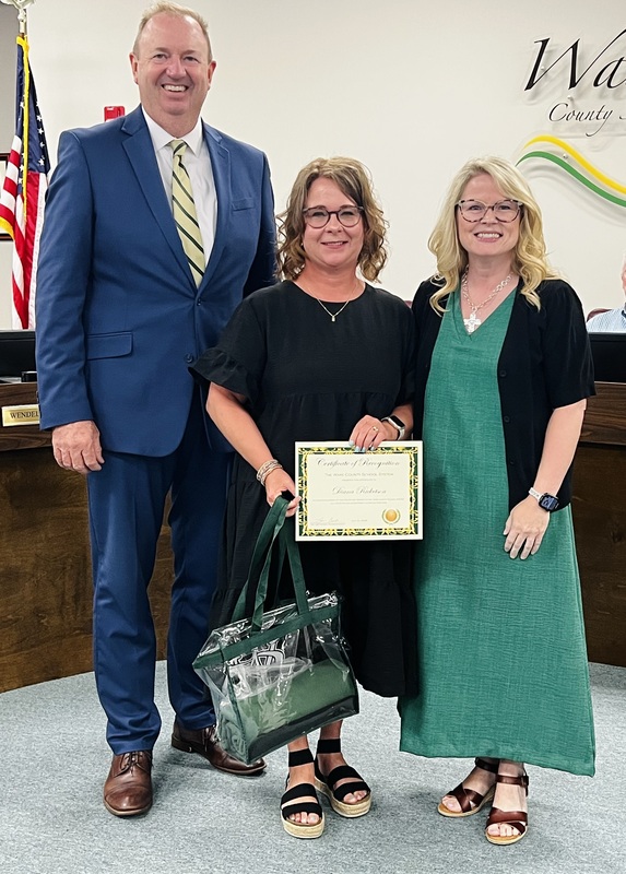 Mrs. Diana Ricketson accepts the Golden Achievement Award.