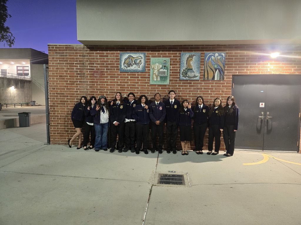 12 Warner students posing after their Opening and Closing Contest