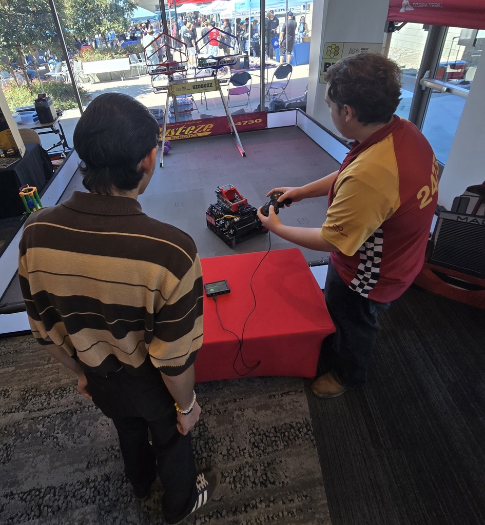 Dylan at a Robot Booth.