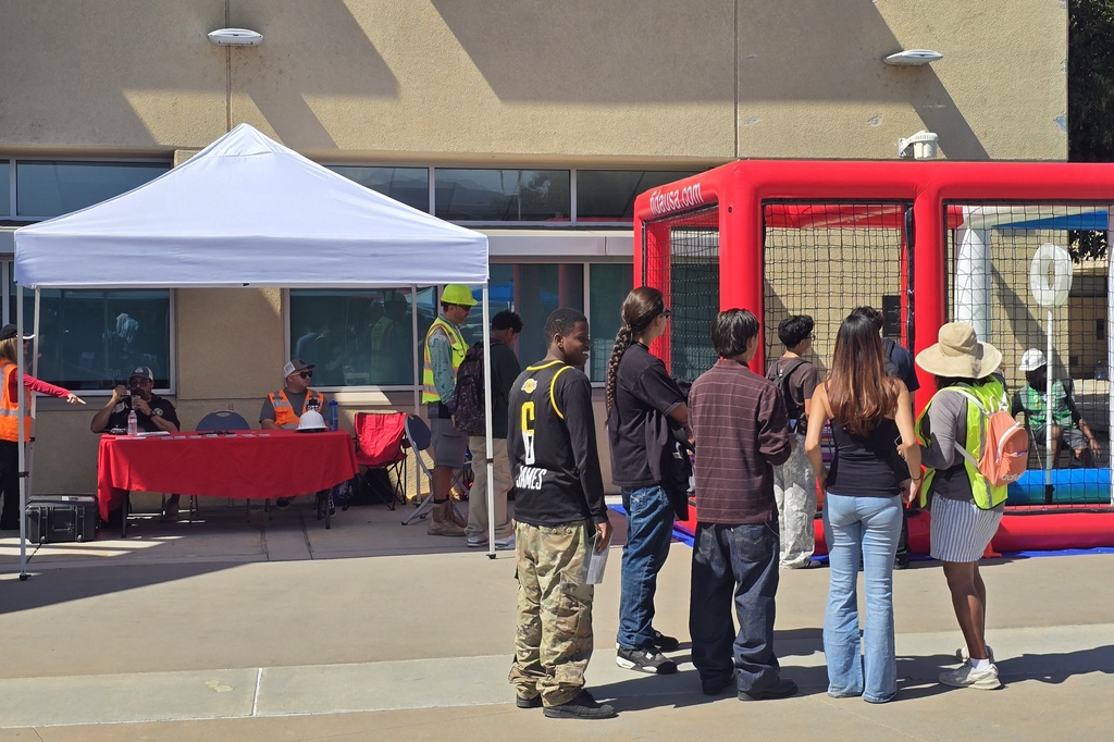 Students at a drone booth.