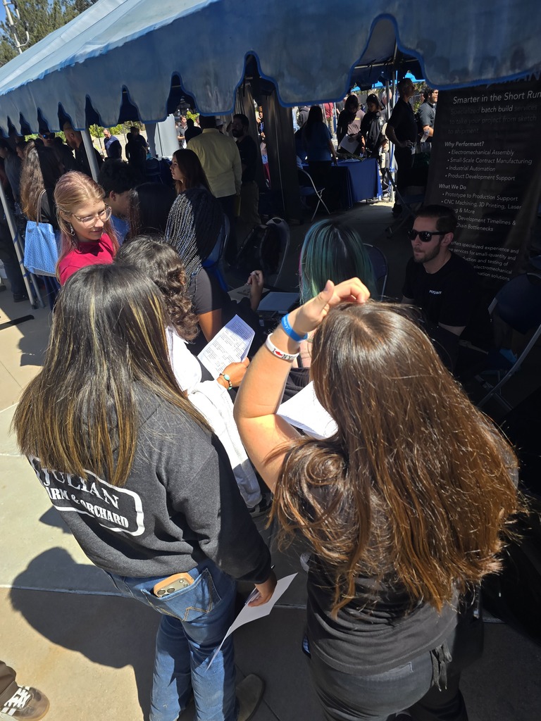 Students at a booth.
