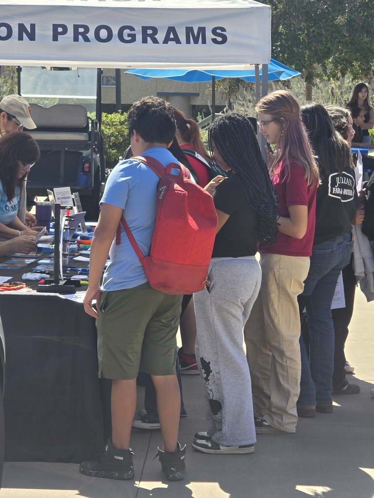 Students at a booth.