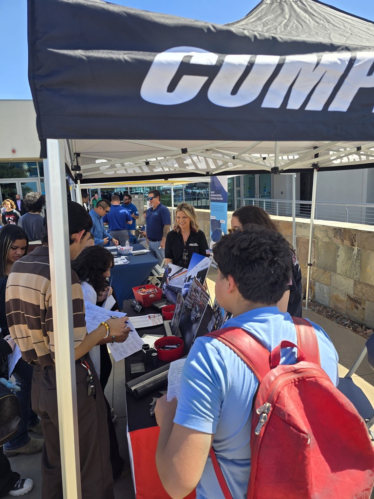 Students at a booth.