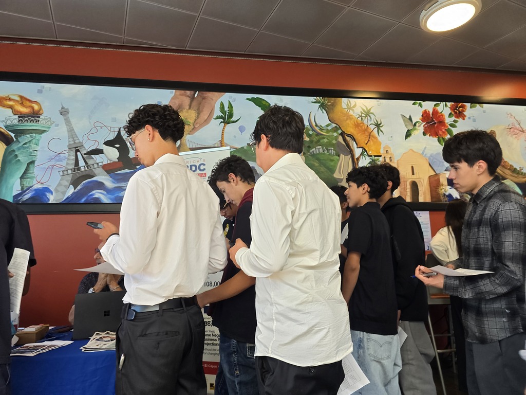 Students at a booth.