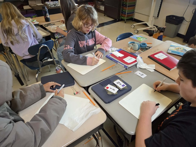 Fifth graders are learning the engineering design process and how to use Earth's resources wisely by construction their own windmills! Each group had a successful windmill able to lift a weighted bucket.