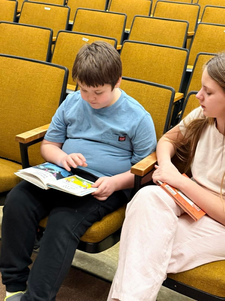 In pajamas they came, with partners to meet, With books in their hands and socks on their feet! From Kindergarten buddies to Fifth Grade pros, Reading together is how Sheffield grows!