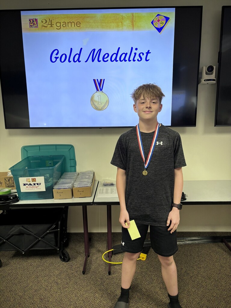 Ashton Carrington who placed 1st overall in the 7th/8th grade division of Math 24 Competition.