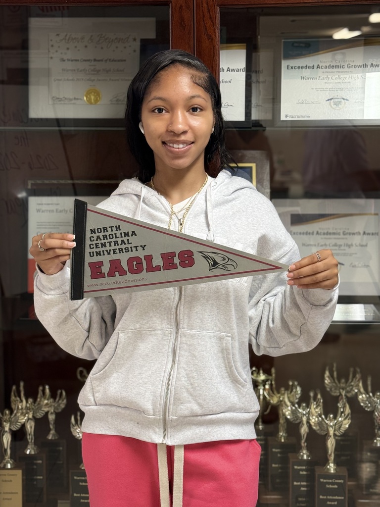 Jakyra holding NCCU flag