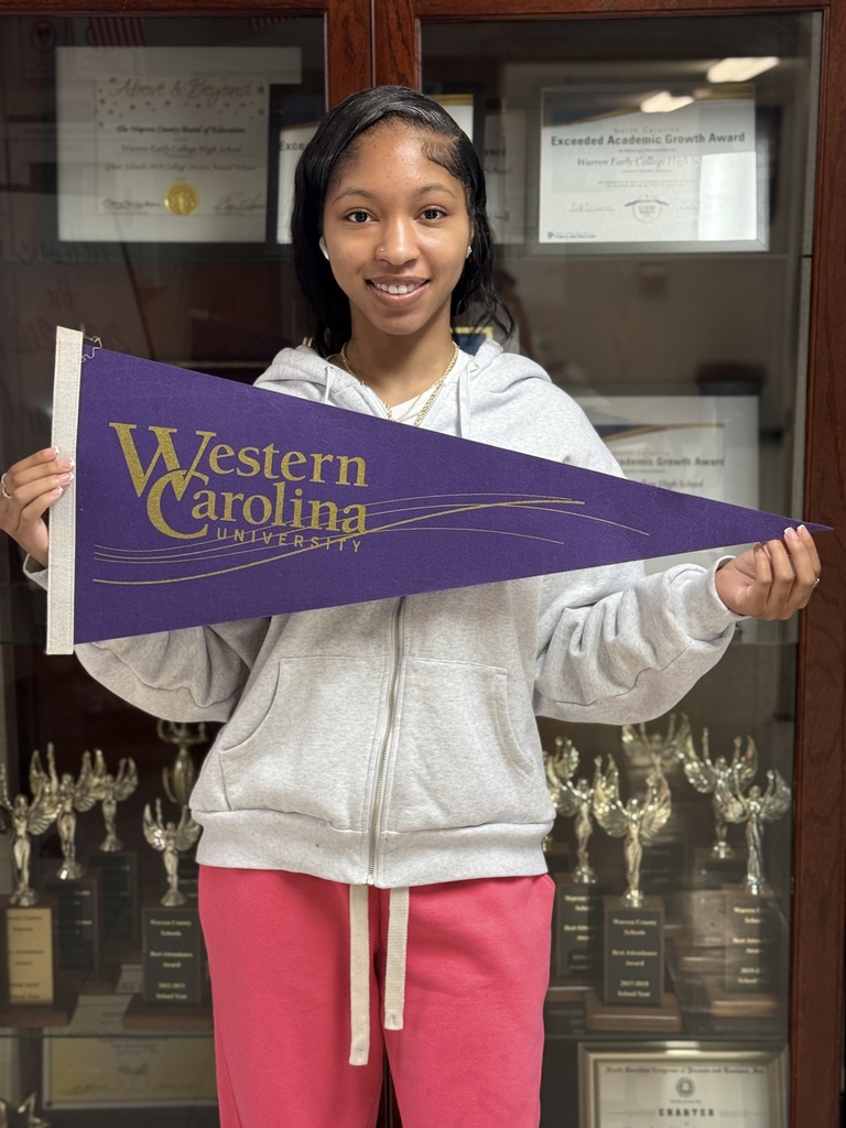 Jakyra holding WCU flag