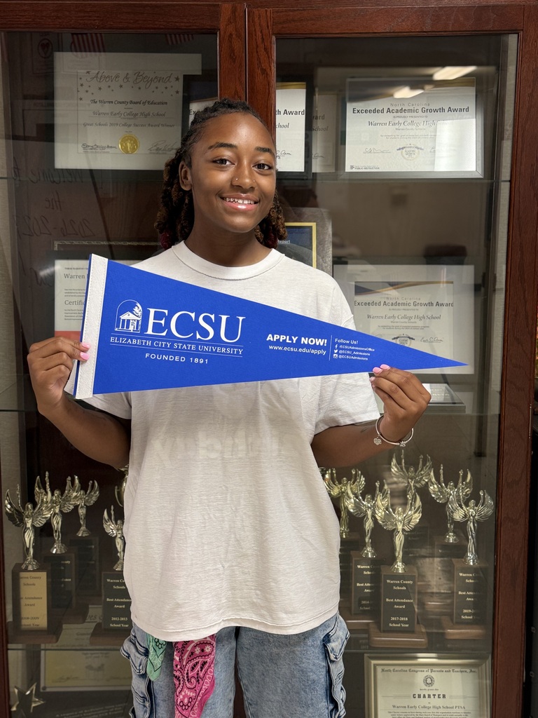 Kenley holding ECSU flag