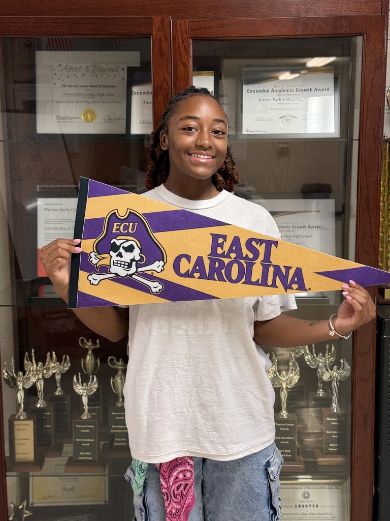 Kenley holding ECU flag