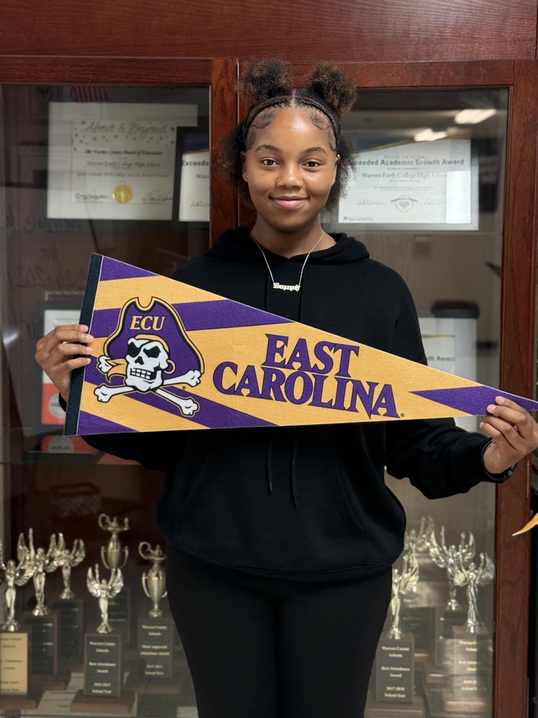 Sequoyah holding ECU flag