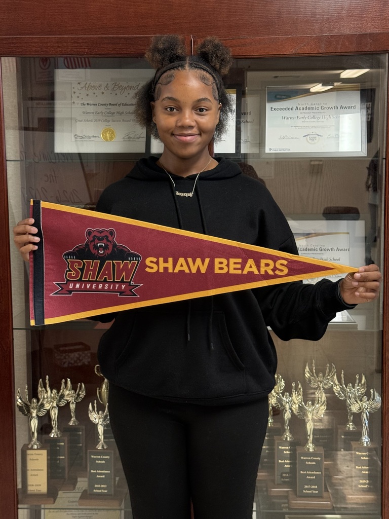 Sequoyah holding Shaw flag