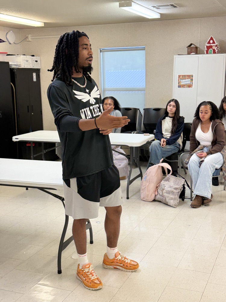 Trevon with students