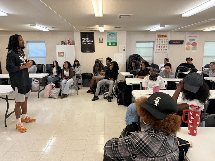 Trevon with students