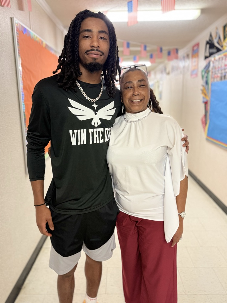 Trevon with students