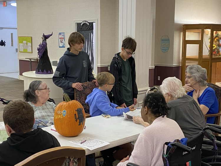 8th Grade Magic Me visited the Country Club today delivering pumpkins made by Life 101 classes to the residents 🎃
