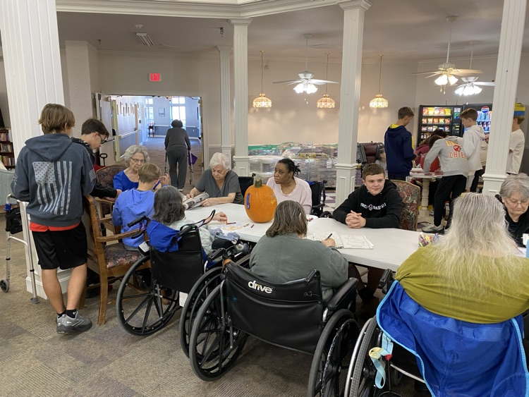 8th Grade Magic Me visited the Country Club today delivering pumpkins made by Life 101 classes to the residents 🎃