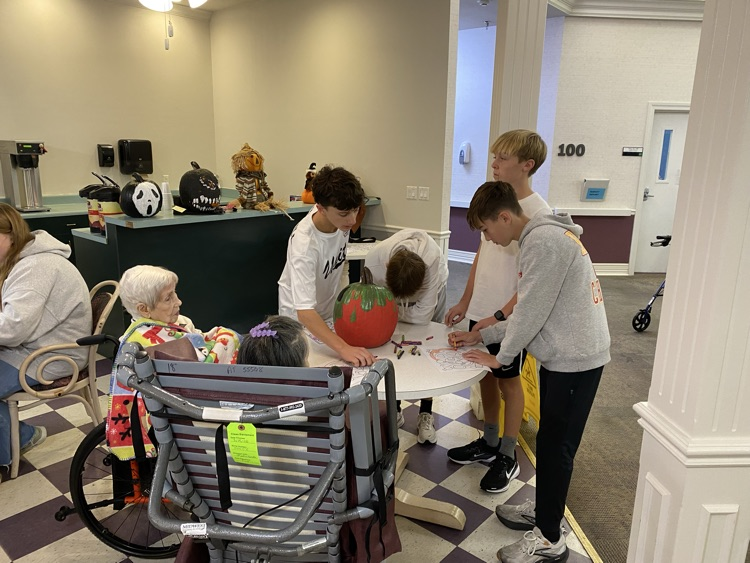 8th Grade Magic Me visited the Country Club today delivering pumpkins made by Life 101 classes to the residents 🎃