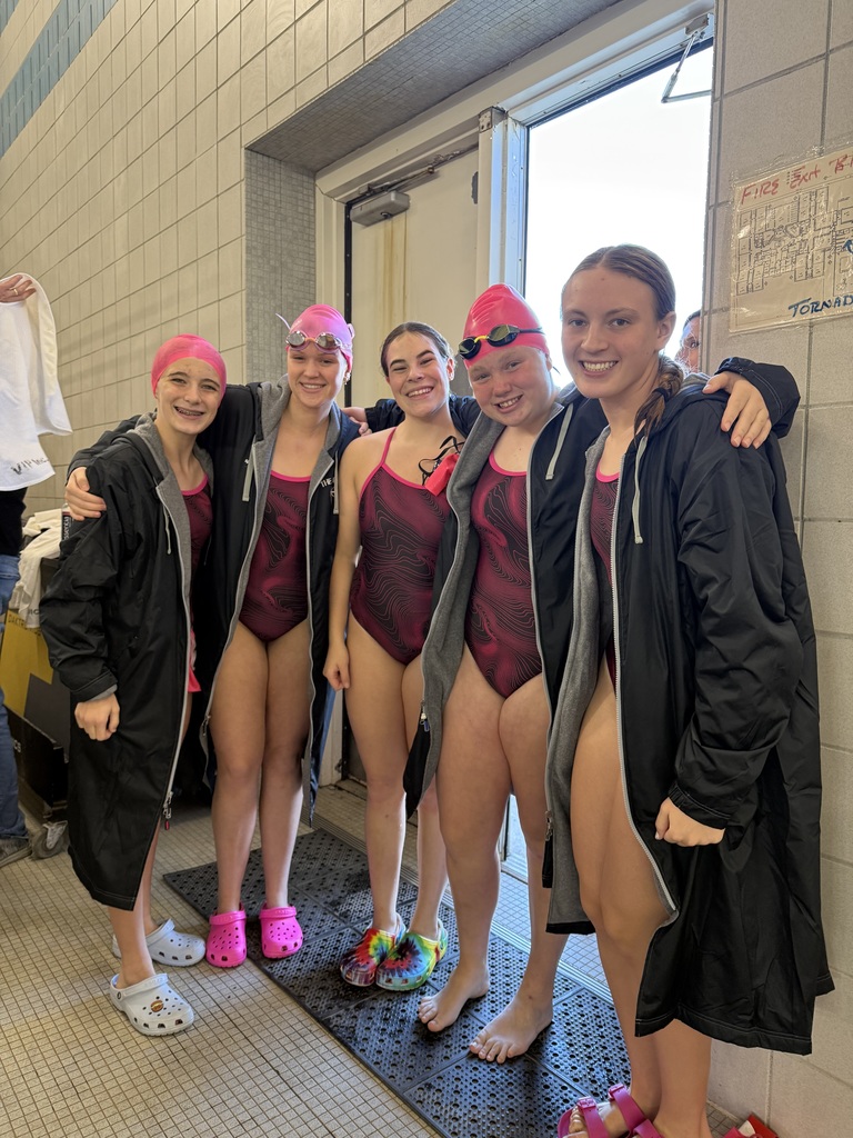 North swimmers wearing pink in honor of Breast Cancer Awareness