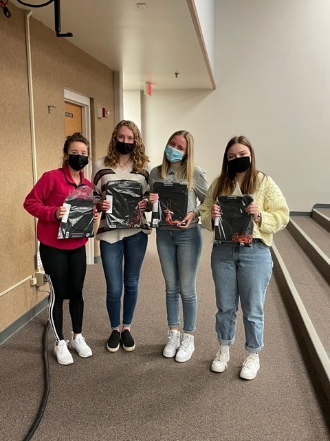 students with caps and gowns