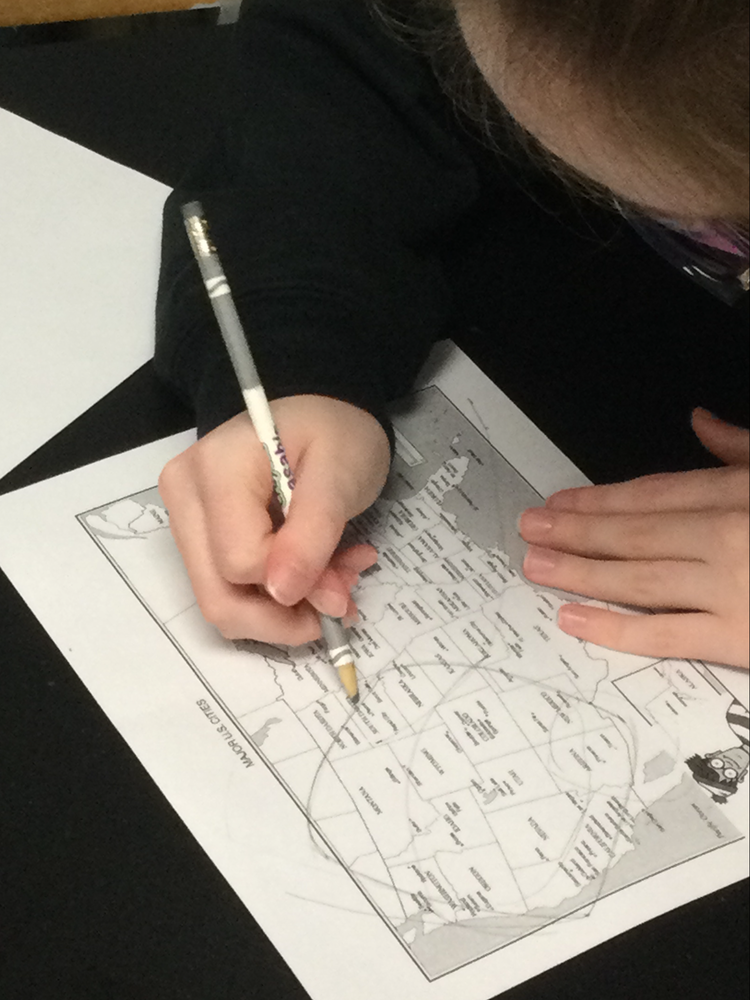 student with map