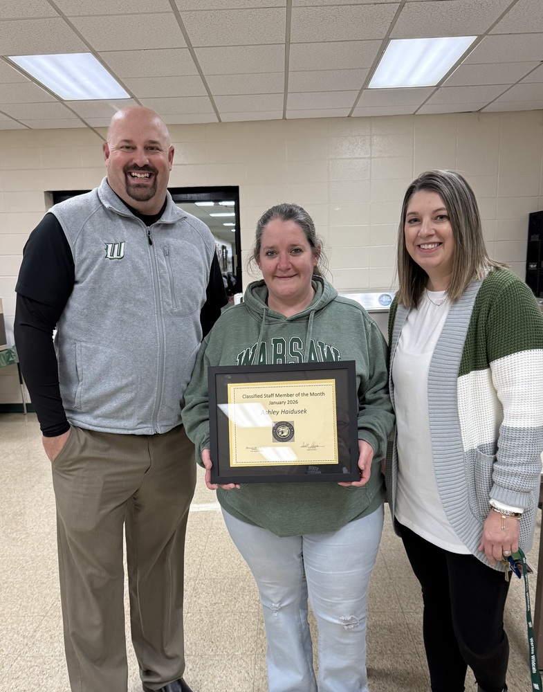 Ashley accepts award. 